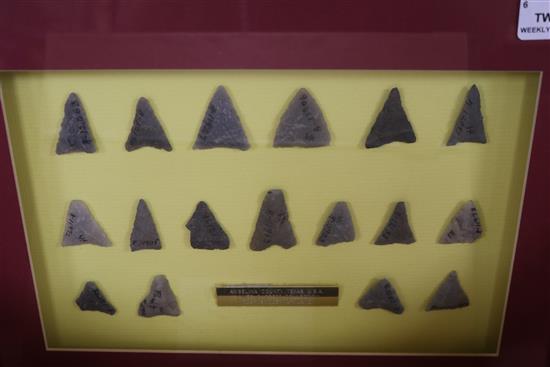 A collection of framed Neolithic and other tools and flint arrow heads,